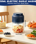 Portable Cordless Electric Garlic Chopper And Vegetable Dicer With 400ml Capacity For Onions Ginger Peppers on kitchen table.