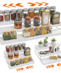 Three Tier Expandable Spice Rack Organizer For Cabinet And Countertop Fully Adjustable Width Design Dead Simple Pantry Layout White Matte Finish with spices and jars.