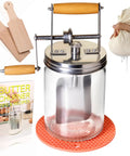 Effortless Hand Crank Butter Churner Fits Classic Mason Jars For Rustic Kitchen Vibes And Making Real Homemade Sweet Cream That The Whole Family Totally Freaks Out Over Daily, with glass jar, wooden paddles, and silicone mat.