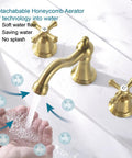 Brushed Gold Widespread Bathroom Faucet 8 Inch 3 Hole With Two Cross Handle Knobs And Drain For Vanity Sink Tap Vintage Classic Style Upgrade Your Bath Game With Long Lasting Shine And Easy Maintenance demonstrating soft water flow over a sink