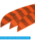 Close-up of Shield Cut Arrow Vanes 10 Pack Four Inch Turkey Feather Fletching Orange Right Wing arrows.