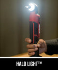 Person holding PWR CORE 12 Brushless 12V Right Angle Impact Driver with illuminated halo light in a dimly lit room.