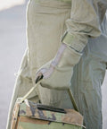 Person wearing Nomex Flight Gloves 2.0 Sage Medium With Upgraded Fit And Supple Dexterity Longer Gauntlet And Leather Reinforcement
