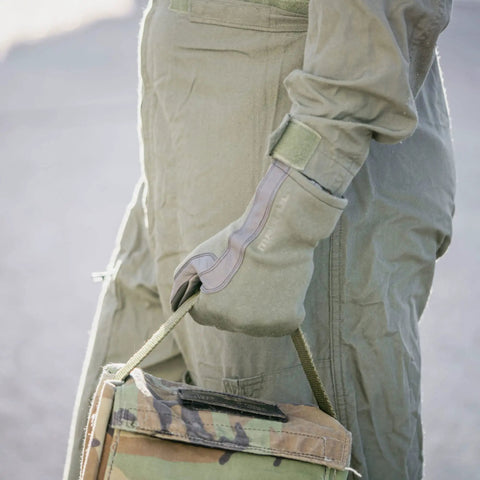 Person wearing Nomex Flight Gloves 2.0 Sage Medium With Upgraded Fit And Supple Dexterity Longer Gauntlet And Leather Reinforcement