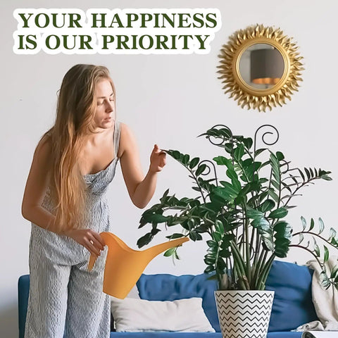 Woman watering potted indoor plant with orange watering can, sunburst mirror on wall, text reads 'Your Happiness is Our Priority'