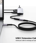 Straight Up Go Fast USB C Extension Cable 6.6 Feet Long connected to laptop for charging and data transfer.