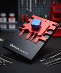 Metal Etching Sheet Bender Tool for Photo Etched Parts and Model Assembly on tabletop with tools nearby