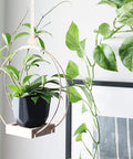 Golden Macrame Hanging Planter For Indoor Outdoor Plants With Wood Stand, lightweight iron rings, minimal design hung by window