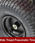 Wide tread pneumatic tire of the Beefy 80-Pound Capacity Professional Turf Spreader With Stainless Steel Frame SureSpread Technology.