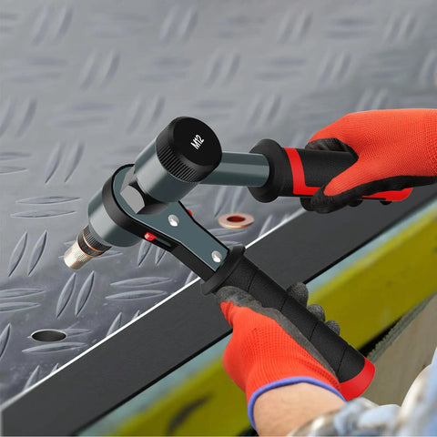 Rivet Nut Tool Kit With Ratcheting Mechanism And Quick Change Mandrels For Fast Installations Includes 10 Metric And SAE Mandrels 100 Rivet Nuts Assortment In Rugged Carrying Case Pro Grade being used on a metal surface.