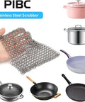 Hand holding 8x6 Inch Cast Iron Chainmail Scrubber for Safe Scratch Free Cleaning of Pre Seasoned Pans Griddles Barbecue Grills and Pots Durable Stainless Steel Wire Cleaner That Removes Residue Without Scratching and Resists Rust, shown with various cookware.