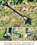 Heavy Duty 5 Tine Pitch Fork For Garden Work With Long Ergonomic T Handle rust resistant stainless steel in use on soil