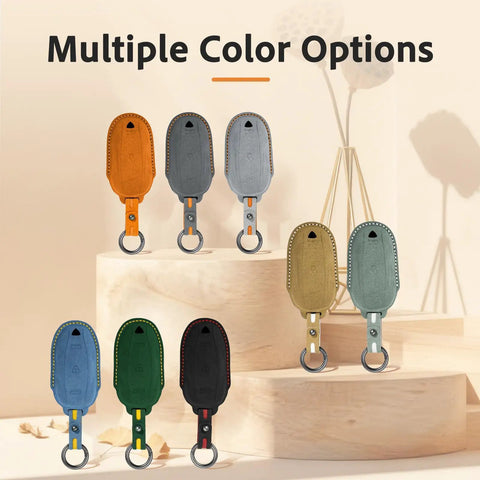 Multiple color options of Premium Suede Leather Key Fob Cover For Tesla Model X, including orange, gray, green, and black.