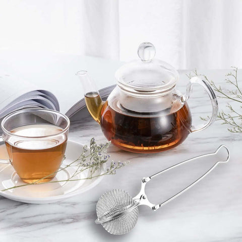 Glass teapot and cup with stainless steel tea infuser ball strainer with handle 3 pack ultra fine mesh filter for loose leaf tea on table