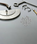 Stainless Steel Eyeglass Screw Washers 100Pcs For Rimless Glasses And Sunglasses Replacement Parts Wear And Corrosion Resistant Flat Gasket Spacers Universal Repair Kit Essentials For No Fuss Eyewear Fixes on workbench