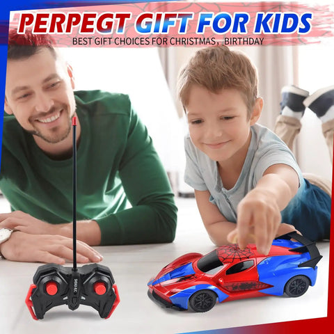 Young boy playing with Spider Themed RC Car For Kids 3 Plus, Remote Control Toy Car Gift For Boys And Girls with smiling dad.