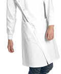 Howie Style Unisex Lab Coat With Cuffed Sleeves And Snap Closure, Classic Fit, 43 Inch Length, Size 2XL worn by a model standing