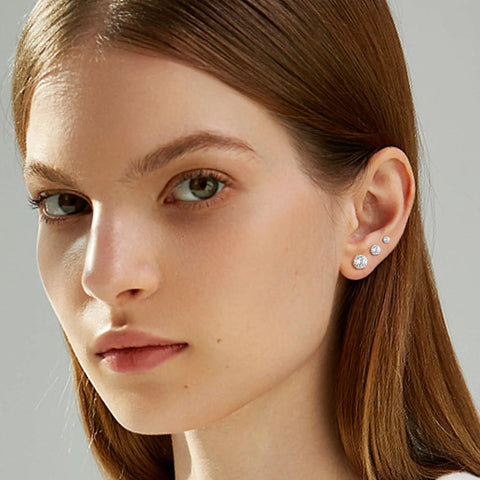 Hypoallergenic Surgical Steel Cartilage Earrings Set For Women With Flat Back Design Includes 12 Tiny Ball Studs And 6 Hoop Pairs CZ Studs Ideal Multi Piercing Jewelry For Helix Tragus First Second And Third Holes. Three CZ flat back studs on ear