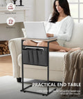 Woman using C Shaped End Table For Couch And Recliner With Under Sofa Sliding Laptop Tray And Storage Pockets, Greige Finish
