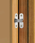 Foldable Hidden Door Hinge For Cabinets, Concealed Cross Hinge Made Of Zinc Alloy And Stainless Steel with silver finish on wood