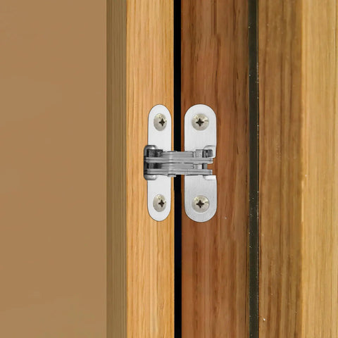 Foldable Hidden Door Hinge For Cabinets, Concealed Cross Hinge Made Of Zinc Alloy And Stainless Steel with silver finish on wood