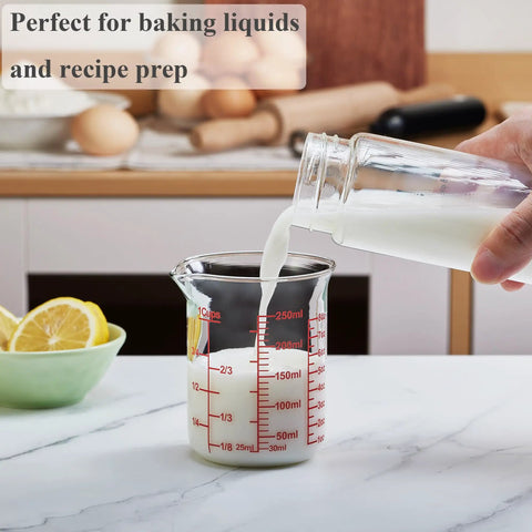 Pouring milk into Borosilicate Glass Measuring Cup 1 Cup 8oz with Spout Your Go To Liquid Measuring Tool For Cooking And Cocktails