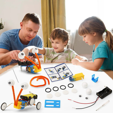 Family building a Four Pack Robot Kits For Kids Ages 8 And Up, STEM crafts and robotics projects, electronics kit on table