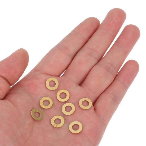 Kick Your Projects Into High Gear With These 50 Big Brass M5x10mm Flat Seal Washers For Heavy Duty Electrical Connections And Hardware Fastening Needs Ensuring Lock Tight Stability To Rock Any Project Easily. brass M5x10mm flat seal washers in hand