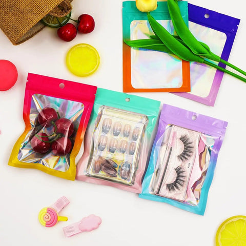 Holographic Mylar Bags With Clear Window And Odor Proof Seal Pouches For Food Storage And Snacking, Grab And Go Ready, assorted items inside.