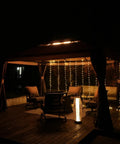 Outdoor Gazebo 10x13 With Mosquito Netting And Curtains, Weather Resistant Patio Canopy For Deck Backyard Garden And Lawn lit at night