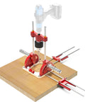 Portable Drill Guide For Dead Nuts Straight And Angled Holes Up To Sixty Degrees with a cordless drill on a wooden surface.