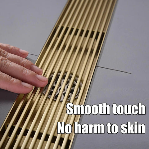 Slick Rectangular Shower Trench Drain With Stainless Steel Grate and Bamboo Hair Strainer, close-up showing smooth touch and drainage.