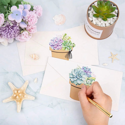Hand writing on succulent-themed name tag stickers from the 120 Pieces Dope Succulent Name Tag Stickers Set With 12 Designs