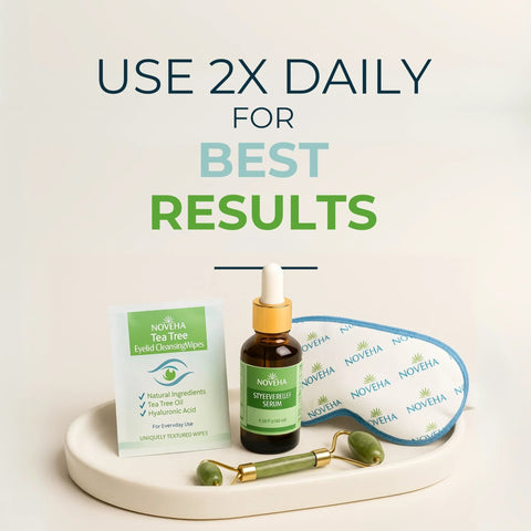 Front view of NOVEHA Tea Tree Eyelid Cleansing Wipes (2-pack) with serum bottle, eye mask, and jade roller on tray.