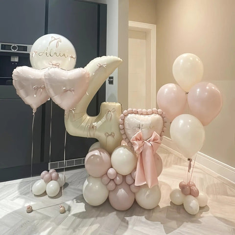 Giant Forty Inch Beige Mylar Foil Number 1 Balloon With Straw For First Birthday And Age Milestone Party Decorations displayed with pink balloons.