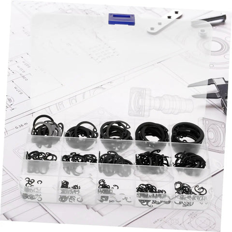 Elastic Circlip Bearing Clips Set Assorted Retaining Rings Kit With Metal Snap Rings in a transparent case on a blueprint.
