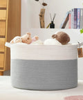 XXL Cotton Rope Blanket Storage Basket 21x21x13.6 Inches Round Toy Organizer For Blankets Towels Clothes And Baby Gear White Grey Mega Sized Durable Laundry Bin For Nursery Living Room Or Closet Organization filled with plush toys.
