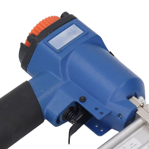 Boss Grade 18 Gauge Pneumatic Brad Nailer Air Powered Nail Gun Featuring An Ergonomic Soft Grip Handle close-up of trigger and grip.