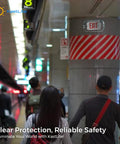 Clear Polycarbonate Emergency Exit Sign Cage Guard For Lighted Signs Built Tough, indoors in a busy public area.