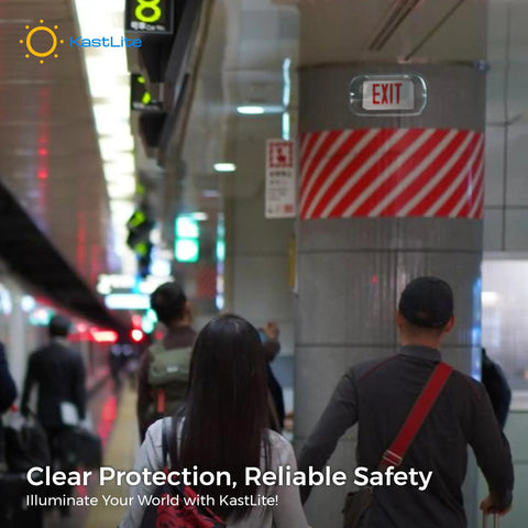 Clear Polycarbonate Emergency Exit Sign Cage Guard For Lighted Signs Built Tough, indoors in a busy public area.