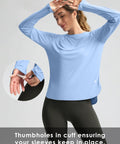 Model wearing Women's UPF 50+ Long Sleeve Sun Shirt, Lightweight Quick Dry, UV Protection for Hiking, Haze Blue, XL, thumbholes visible