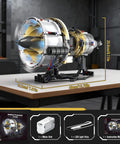 Jet Engine Building Set With Visible Turbofan Model Kit on tabletop, transparent cylinders showing internal pistons, includes motor and lights.