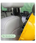 Hard Hat Headrest Hook Organizer For Truck Cab, 3-Second Install Helmet Holder Mount shown securing a yellow hard hat on seat.