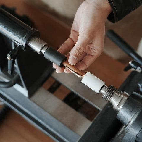 Hand using Pen Press Kit for Woodturning Lathes 2MT Taper Pro Setup with Dual Nylon Pads for precise lathe pen making