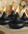 Two Pack Metal Table Top Torches With 24.5 Ounce Citronella Fuel Capacity Refillable Outdoor Flame Light Lanterns on table