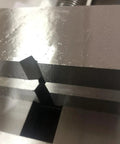 Close-up view of Precision Toolmakers Vise Grinder jaws, showing the flat tongs and solid HRC hardened steel material.