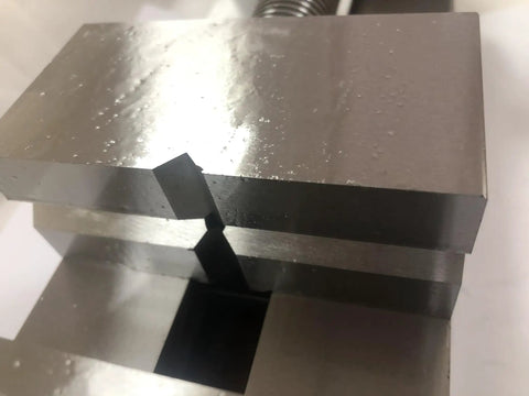 Close-up view of Precision Toolmakers Vise Grinder jaws, showing the flat tongs and solid HRC hardened steel material.