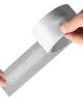 Hands holding white roll of Window Screen Repair Patch Tape No Fuss Self Adhesive Mesh Patch With Double Sided Adhesive Easy Peel And Stick Quick Fix For Holes In Steel Screens At Home White