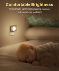 Two Pack LED Night Lights That Plug Into Wall With Dusk To Dawn Sensor next to sleeping baby in dimly lit bedroom