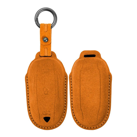 Premium Suede Leather Key Fob Cover For Tesla Model X in orange, showcasing hand-stitched design and keyring for safety.